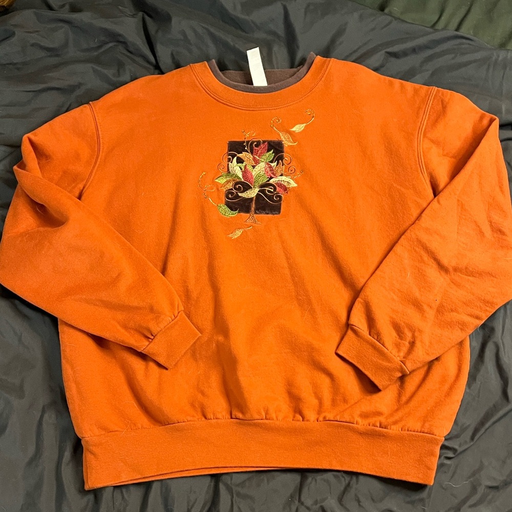 Vintage Orange Crewneck Sweater with Graphic Design